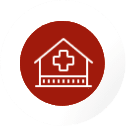 Red circular icon featuring a hospital or healthcare building with a medical cross, representing healthcare training programs, nurse education pathways, and professional nursing employment opportunities in Germany—ideal for those pursuing nursing Ausbildung in Germany, a nursing course in Germany, or a nursing job in Germany.